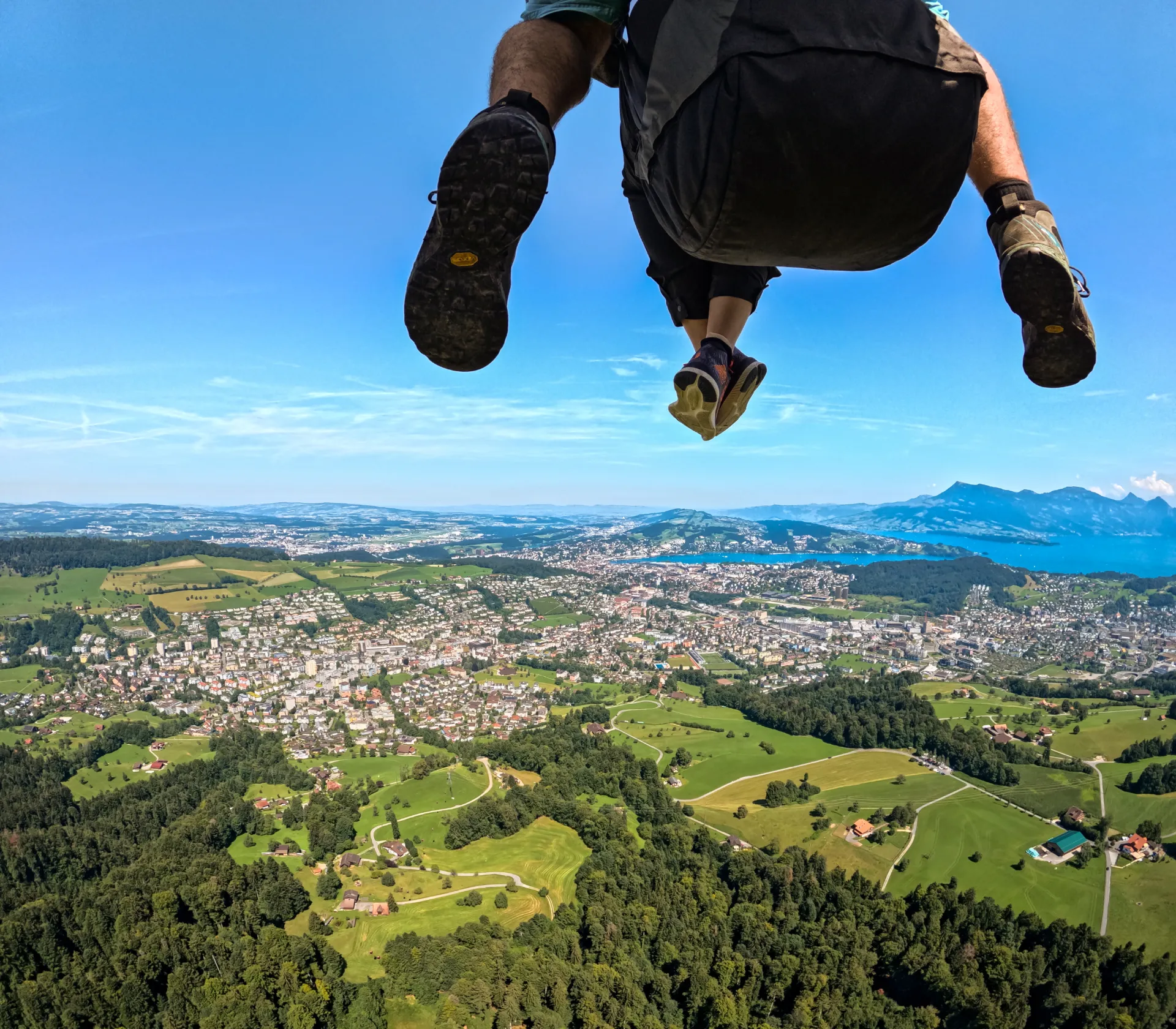 Paragliding above Lake Lucerne with the city of Lucerne below