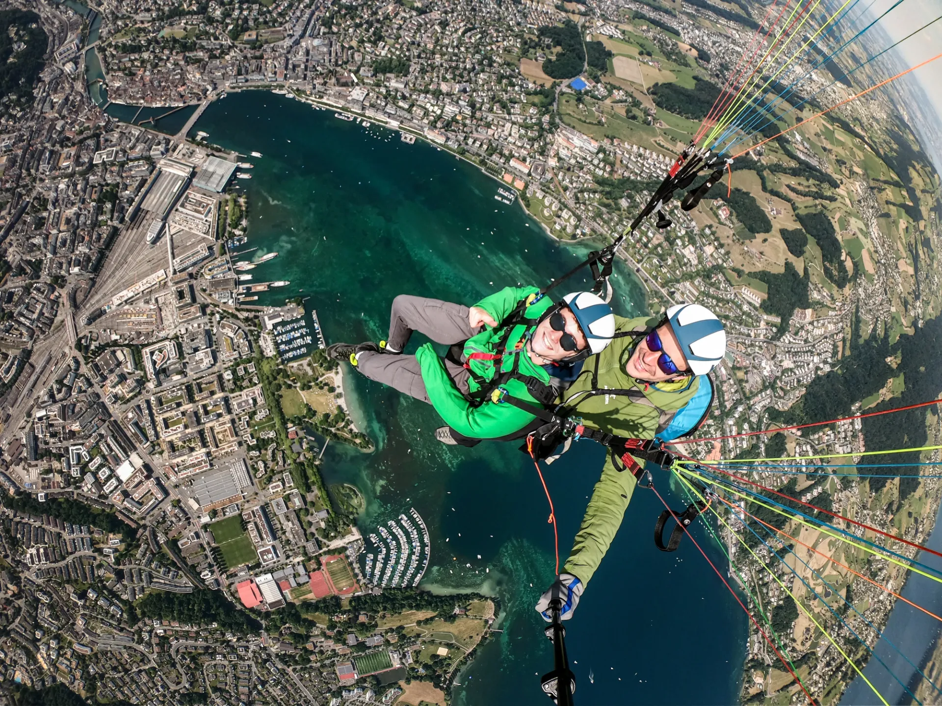 Tandem paragliding over Lake Lucerne with wide scenic perspective